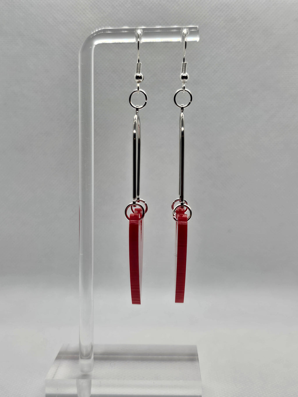 Red heart-shaped earrings.  image 1