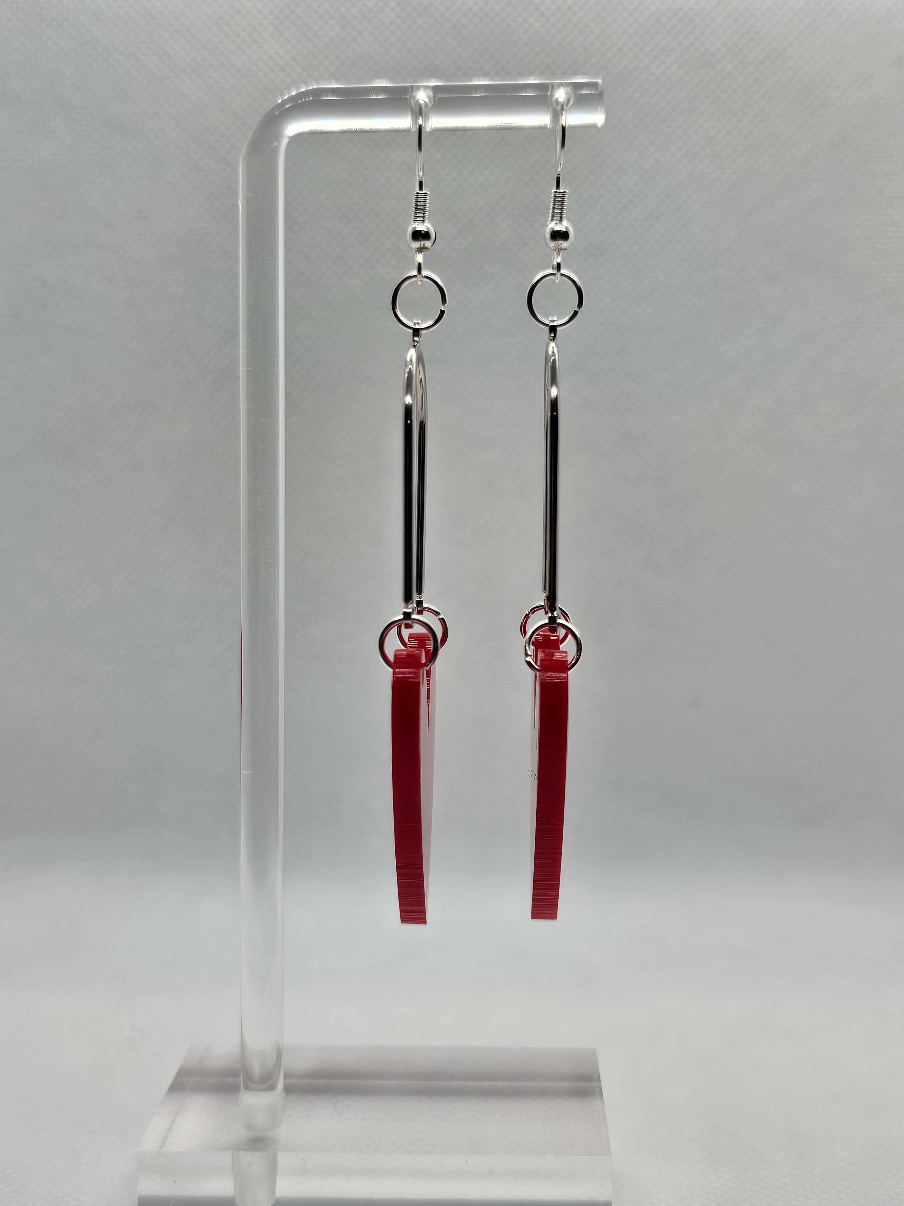 Red heart-shaped earrings.  image 1