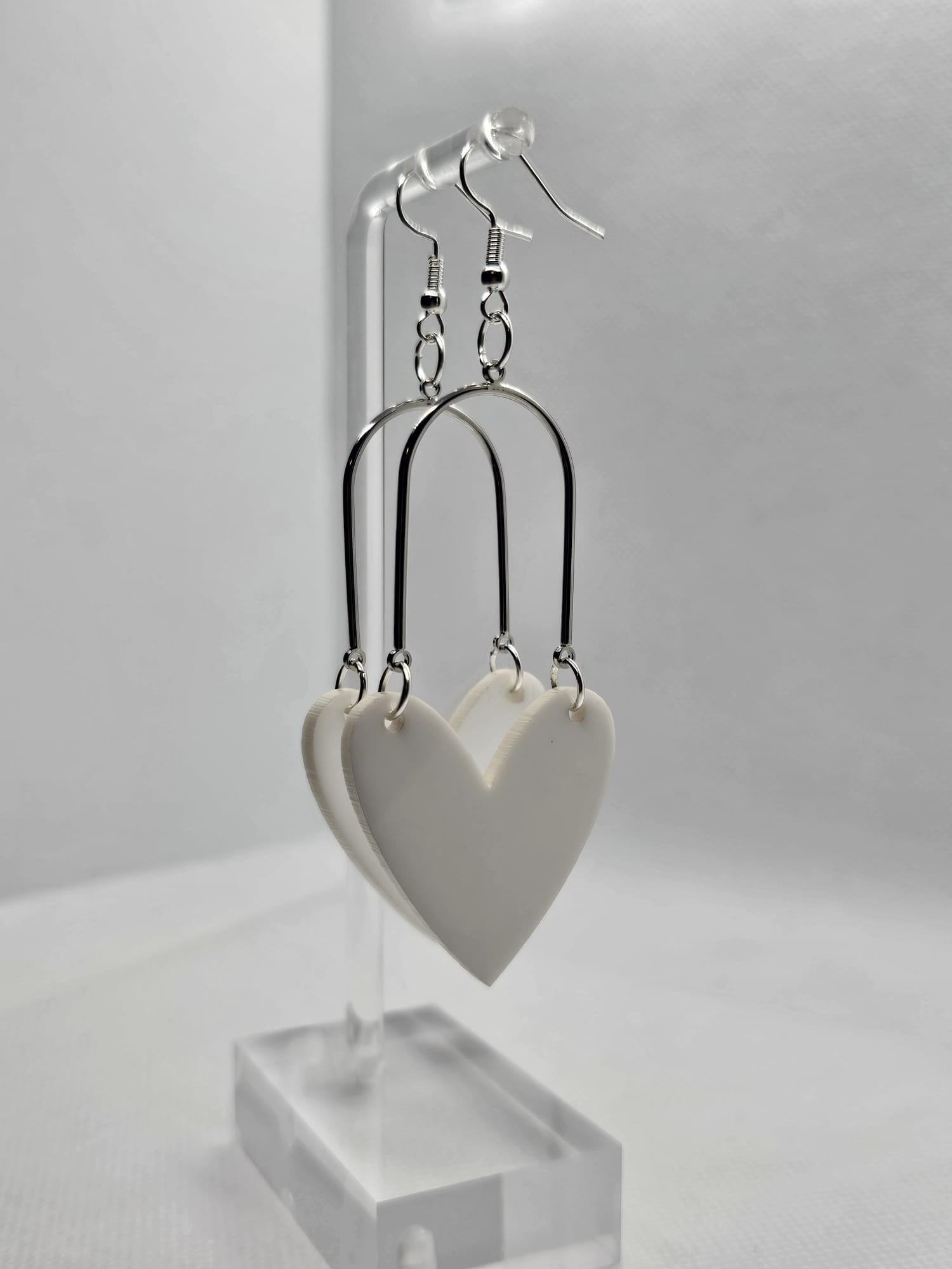 White heart shaped with silver findings image 0